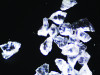 (1.) Microscopic view of the angular, sharp-edged morphology of aluminum oxide particles used in air abrasion, which research has shown to be more effective than the use of round beads.