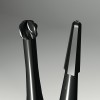 Figure 10   Comparison of the shape of a conical carbide bur with traditional round bur. The tip size of the conical bur is half that of the corresponding round bur.